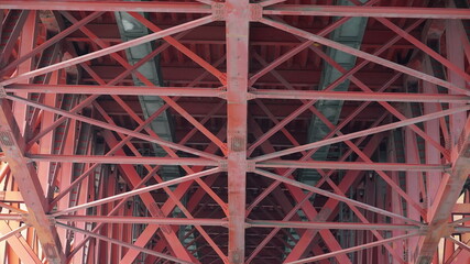 Steel structure under the red bridge