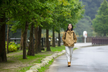 Woman walk along the hiking trail