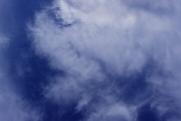 Rich blue sky with white clouds.