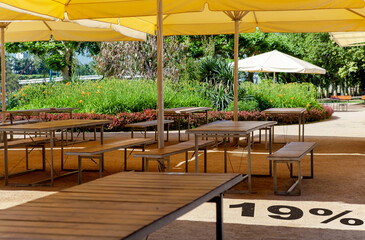 Outdoor restaurant. written Text on ground 19%. starts from of 2024, increase of the VAT rate to 19...