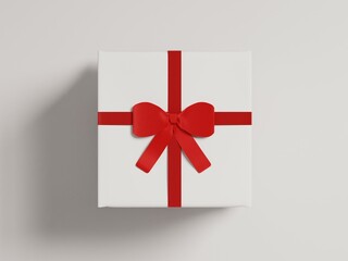 Mock up of a closed gift box with red ribbon as a flat lay isolated on a plain white background as 3d rendering