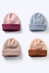 A group of four hats sitting neatly on top of a white surface. Versatile and suitable for various themes and concepts