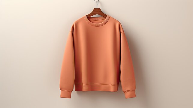the Fashion color 2024 trend by showcasing a basic sweatshirt lying elegantly a light background, simplicity and style in a minimalistic fashion layout.