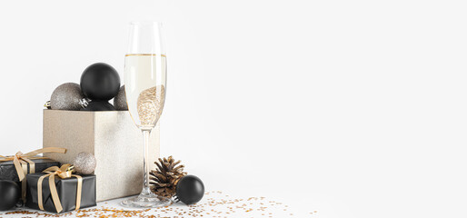 Glass of champagne, Christmas gifts and beautiful decorations on white background with space for...