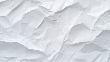A crumpled white paper texture with multiple creases and folds creating an abstract pattern.