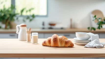 Freshly baked croissant is presented on a plate next to a white coffee mug and a small bowl of nuts, all arranged on a wooden table with a warm, inviting light.