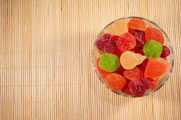 top view glass of fruit jelly with sugar