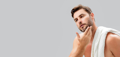 Banner of man with perfect skin touch face after shaving. Skin care healthcare cosmetic procedures...