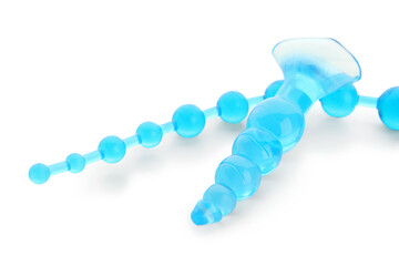 Blue anal plugs from sex shop on white background