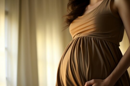 Beautiful Close-up Shot of a Serene Pregnant Womans Belly, Symbolizing the Miracle of Life
