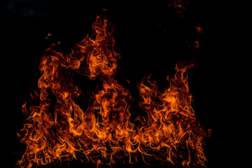 Fire flames on black background. Fire burn flame isolated, abstract texture. Flaming effect with burning fire.