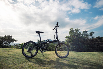 Folding bike on tropical mountain top