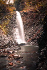 Huk waterfall in the Carpathian Mountains in autumn