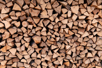a pile of firewood stacked evenly