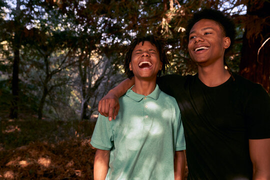 Young Black Teenage Siblings Taking a Selfie in Nature Together Playing 