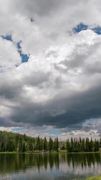 Vertical Timelapse of clouds moving over Lyman Lake in the Utah wilderness in the Uintas.