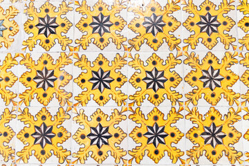 Yellow decorative tiles on a house near the Tunis Souk.