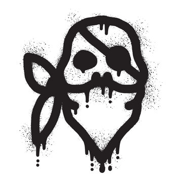 Pirate skull graffiti wearing a bandanna with sprayed paint