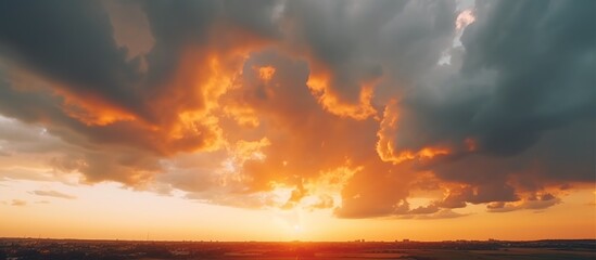 Dramatic stormy clouds at sunset with golden color sky. AI generated - obrazy, fototapety, plakaty