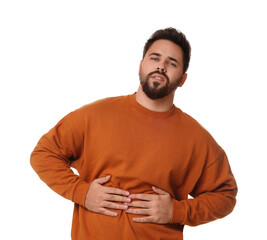 Young man suffering from stomach pain on white background