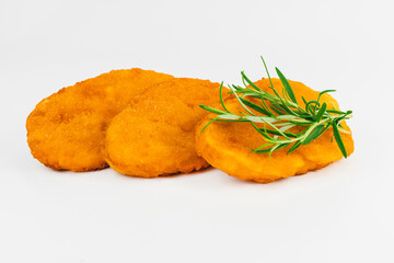 Breaded Chicken Inner Fillet, Chicken Breaded Raw Meat. Fast cooking.Breaded Chicken nuggets Fillet with salad on a White Background,food at home. Fast homemade food.Chicken breaded schnitzels.