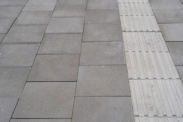 Tactile Paving on Modern Tiles Pathway for Blind Handicap, Safety Sidewalk Walkway for Disability...