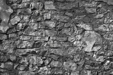 old gray stone wall closeup