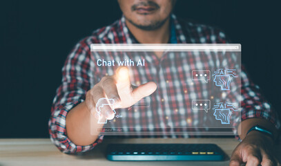 Man hand touch screen virtual graphic chat with AI, Artificial Intelligence. businessman using...