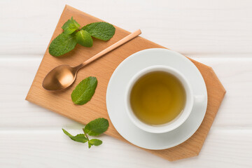 Fresh mint tea on wooden background,top view