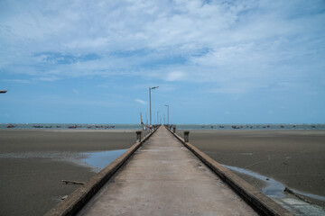 Pathway of a rural fisherman's wharf in Thailand in the morning.