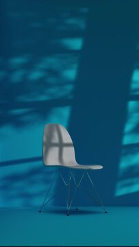 Looping 3D Rendered Single Chair in Empty Blue Room with Shadows From Windows and Trees
