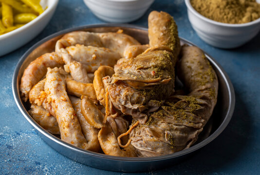 Traditional Turkish Stuffed rice tripe or offal food on the table in Turkish Restaurant. Shirdan Dolma is the favorite food Adana city of Turkey. (Turkish name; Sirdan)