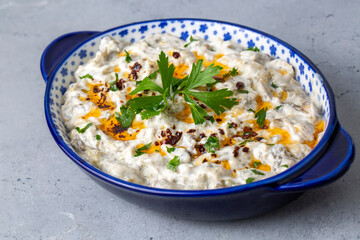 Traditional Turkish cuisine; Appetizer, salad made with eggplant and yoghurt. local name; Mutebbel