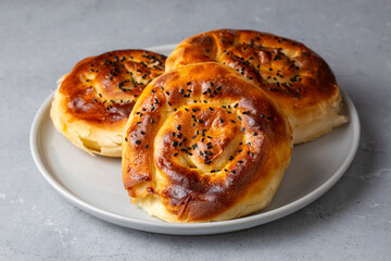 Traditional delicious Turkish phyllo stuffed with spinach, cheese (Turkish name; Gul borek or gul boregi) Rose shaped pastry.