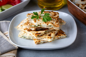 Traditional Turkish food, Turkish pancake gozleme with cheese and herb.