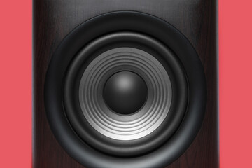 One wooden sound speaker on red background, closeup