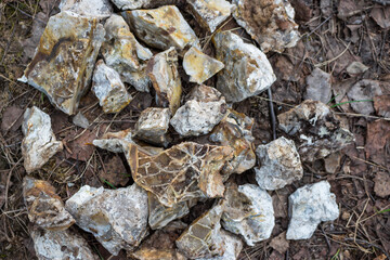 A flint nodule split into pieces with fine-crystalline quartz filling the internal cavities