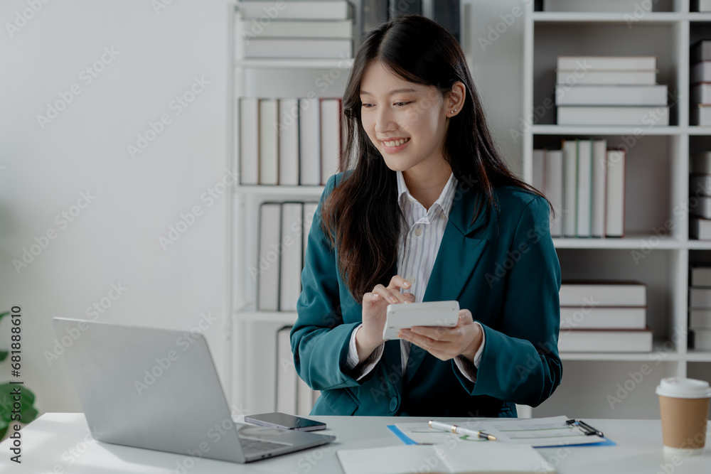 Poster accountant calculating numbers on calculator, auditor is working on accounting in the office, numeri