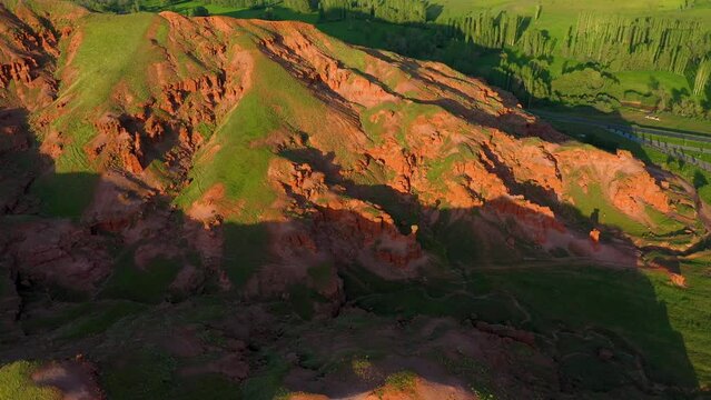 Aerial view of fairy chimneys and rock formations in Narman district of Erzurum province and the social facility next to them