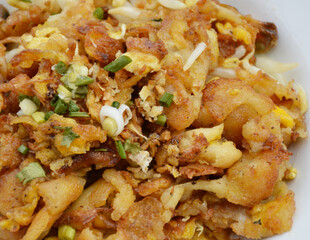 Crisp fried mussel pancakes.(Hoi Tod)