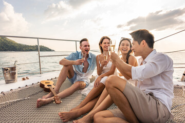 Group of diverse friends drink champagne while having a party in yacht.  - Powered by Adobe