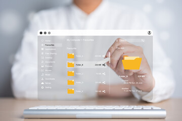 Businessman using laptop to explore document files on enterprise server. DMS, Cloud backup online...