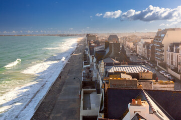 Sunny aerial view of beautiful walled port city of Saint-Malo at high tide, Brittany, France