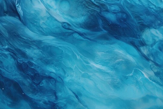 Swirling patterns of teal and aqua, resembling the interplay of ocean waves at twilight. © StockWorld