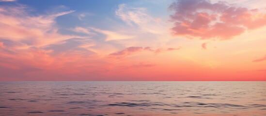 Fototapeta premium As the evening sun began to set over the horizon, the clouds were tinged with hues of orange and pink, creating a breathtaking abendrot. The vacationers gathered by the shore, warmly embracing the