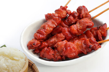 Thai-style grilled chicken. Thai chicken skewers street food