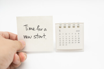 Time For A New Start text on paper with 2024 JAN calendar, Business Concept. New Year New Start.