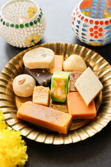 Diwali sweets Gujiya barfi Motichoor Laddu Rasmalai Indian sweet dessert mithai festival dish...