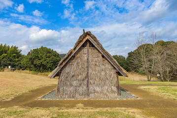 Fototapeta na wymiar Post in ground construction restored residence in the Nara period of Japan.