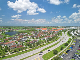Aerial view of homes and apartments along the main thoroughfare in Viera, Florida, a golf centered lifestyle residential community in central Brevard County near Melbourne on Florida's Space Coast.